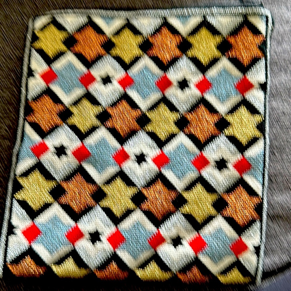 Handmade needlepoint bag for evening or for any occasion. Zipper on top.